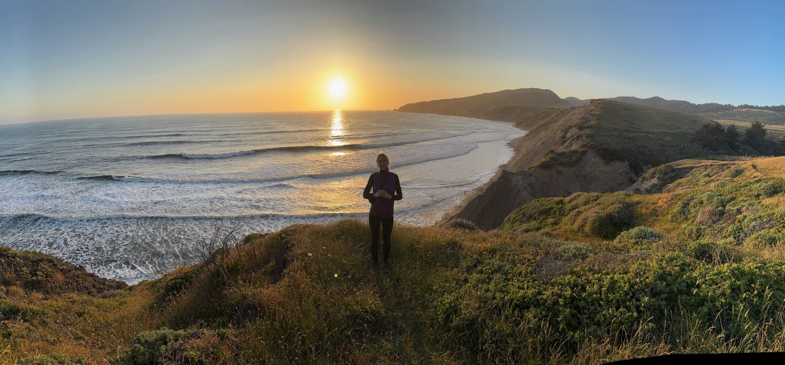 Abigail on hill overlooking ocean
